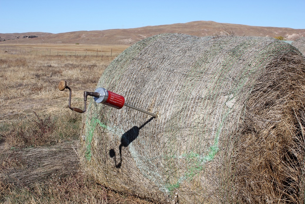 Hay samples should be taken using a hay probe or a core sampler.  Photo courtesy of Troy Walz.
