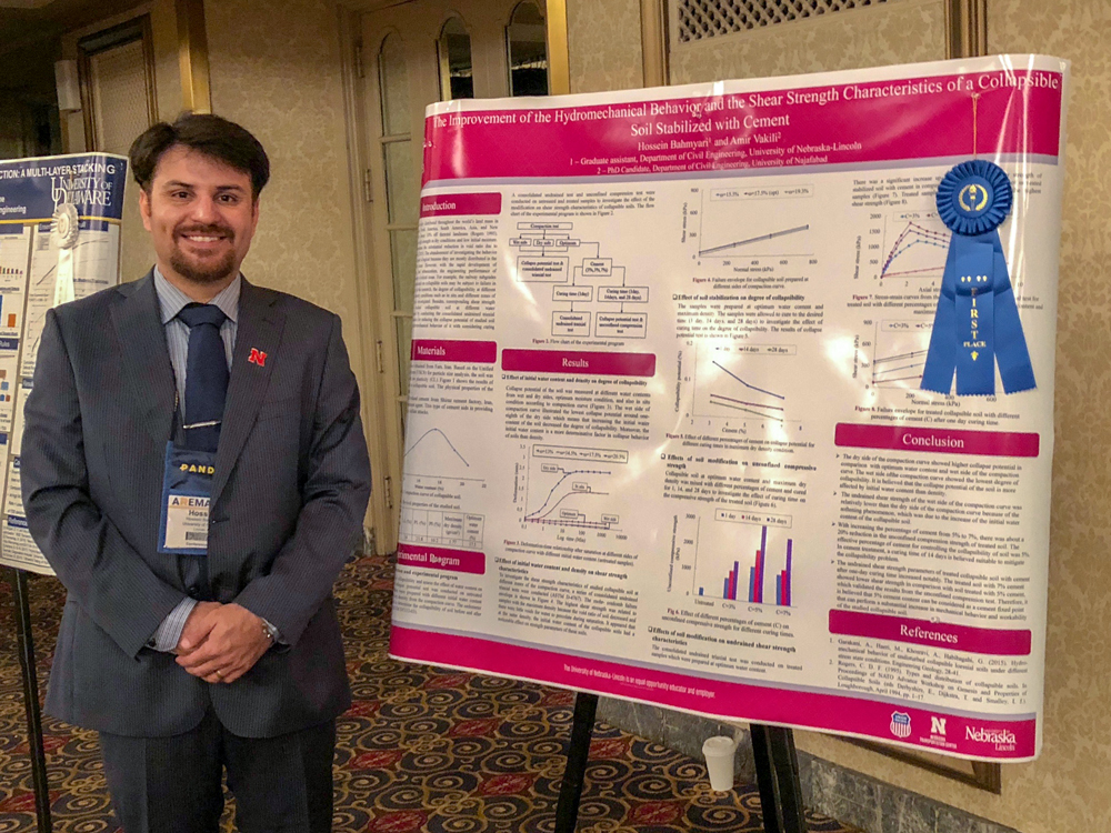 Hossein with his poster at AMERA 2018.