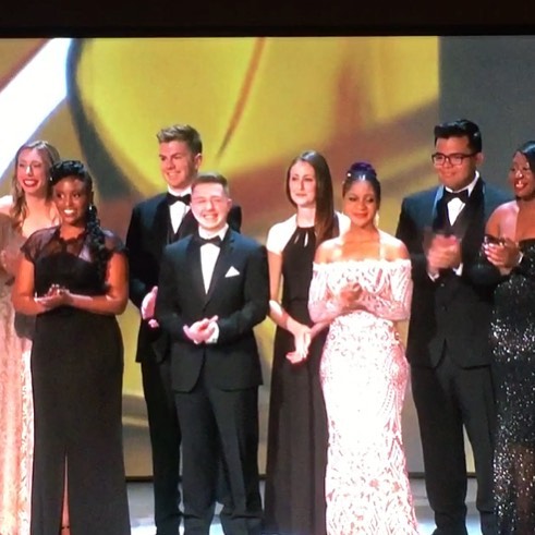 Candace Nelson (back row, third from left) on stage at the Emmy Awards.