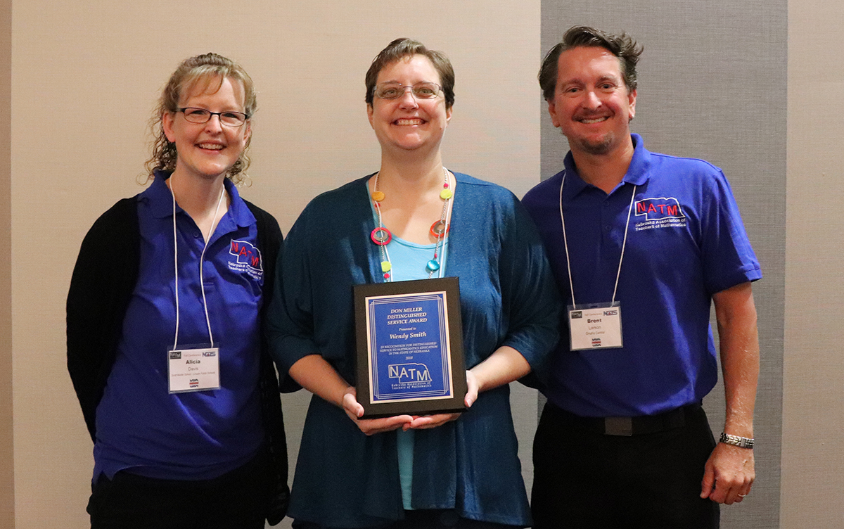 Wendy Smith (center) is the 2018 recipient of the Don Miller Award, presented to her by NATM board members Alicia Davis and Brent Larson.