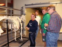 Department of Animal Science Professor Dennis Brink (right) interacts with some students from various schools at our annual an annual Open House at the University of Nebraska-Lincoln animal science complex.