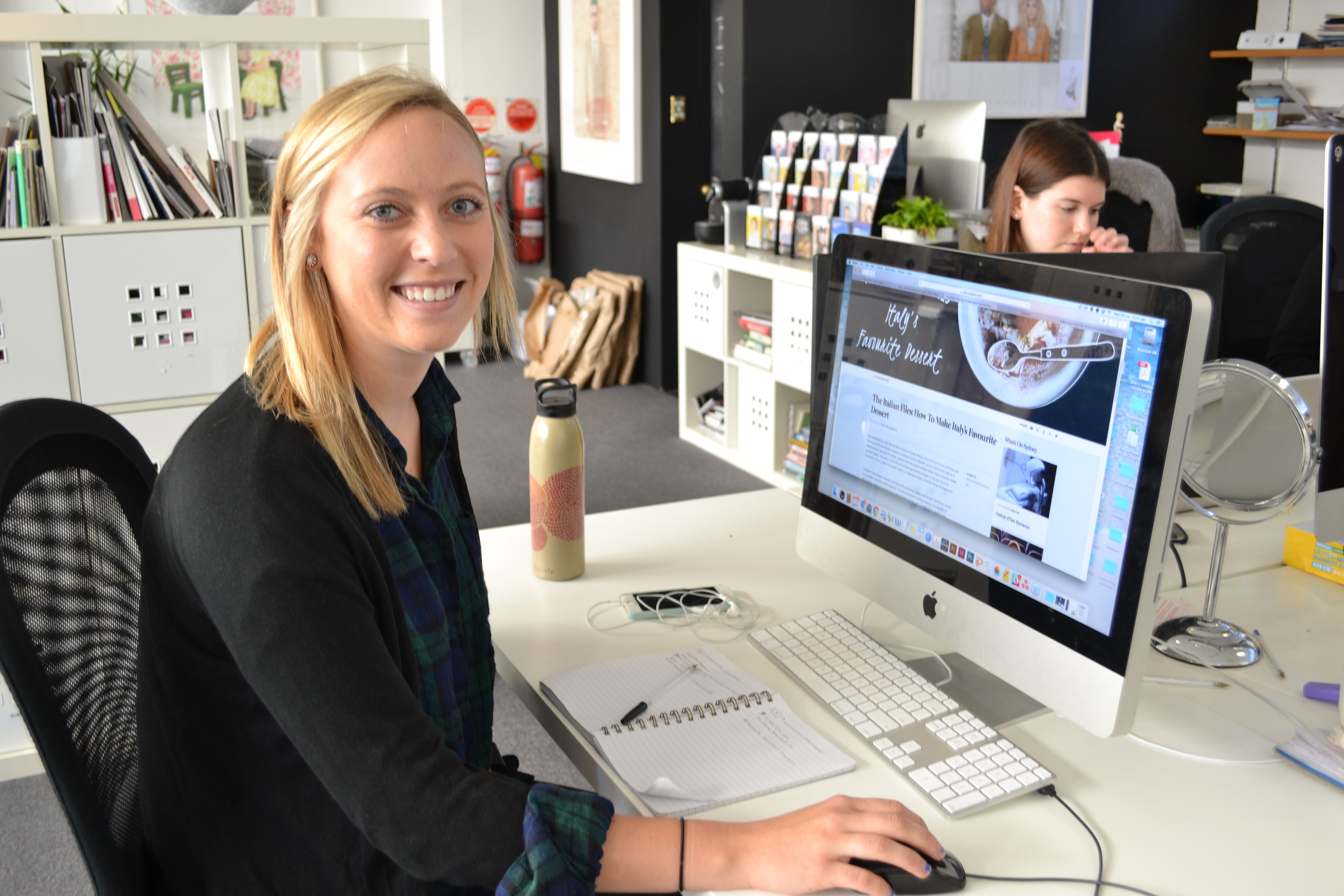 Novak at her desk while working on a project for Urban Walk About. (Photo courtesy of Sydney Novak)