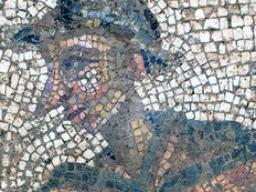 The mythological figure Narcissus appears in this detail of an ancient latrine's mosaic floor. Courtesy photo.