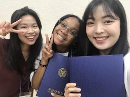 Young (center) poses with South Korean students. Young studied in South Korea last summer after receiving a U.S. State Department Critical Language Scholarship.