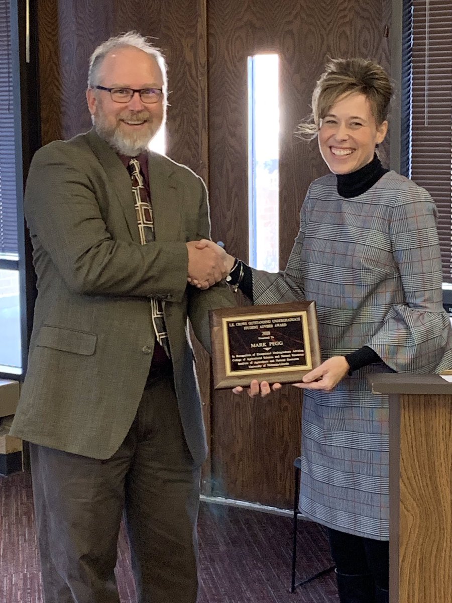 Mark Pegg accepts the Lawrence K. Crowe Outstanding Undergraduate Advising Award. | Courtesy image