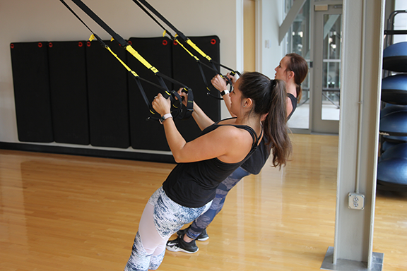 Students enjoy the TRX strength classes in the Rec & Wellness Center.