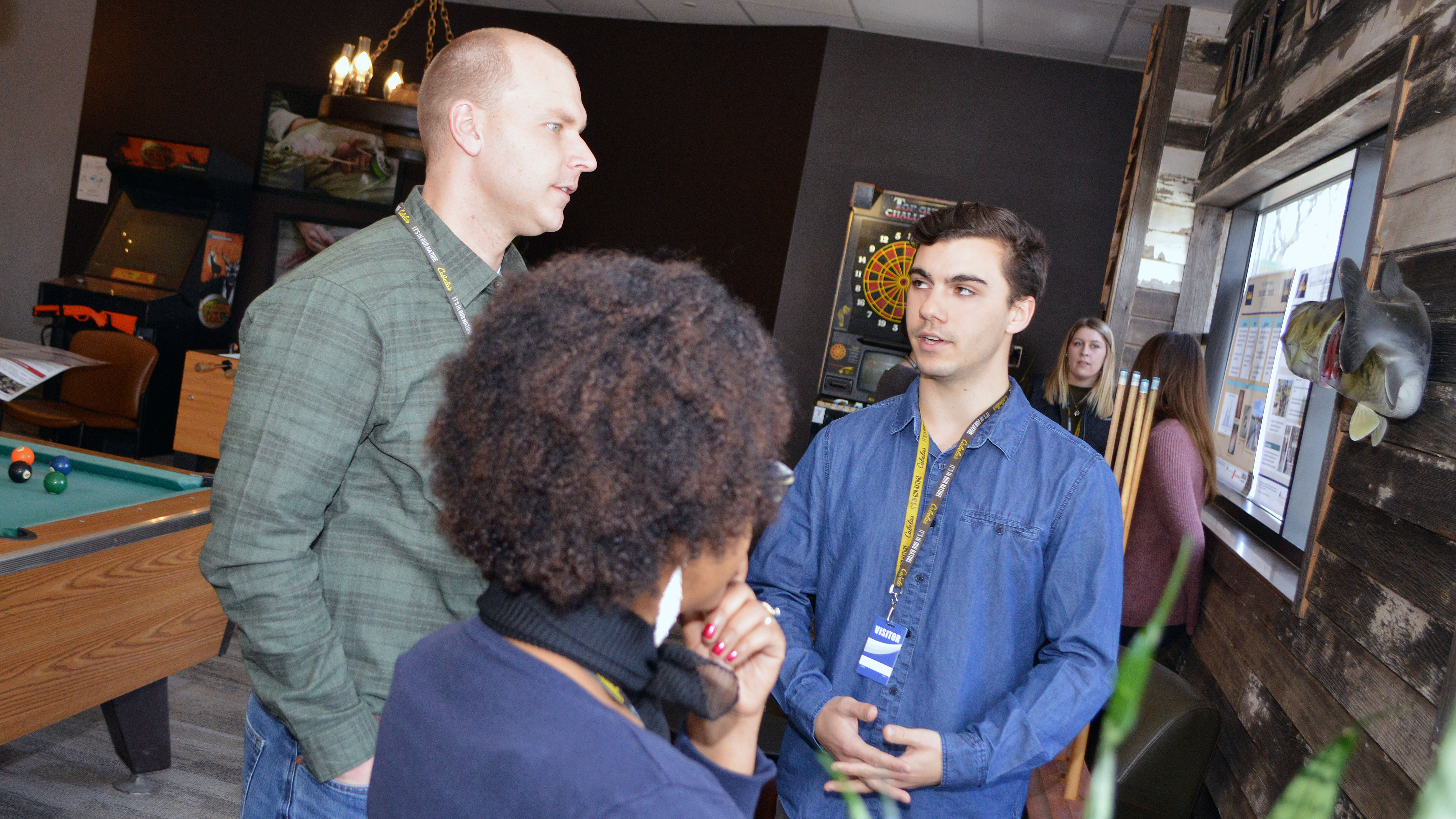 Mike True presents his work to Cabela's staff during the 2018 Cabela's Apprenticeship Poster Session at the outdoor store's headquarters in Lincoln. | Shawna Richter-Ryerson, SNR