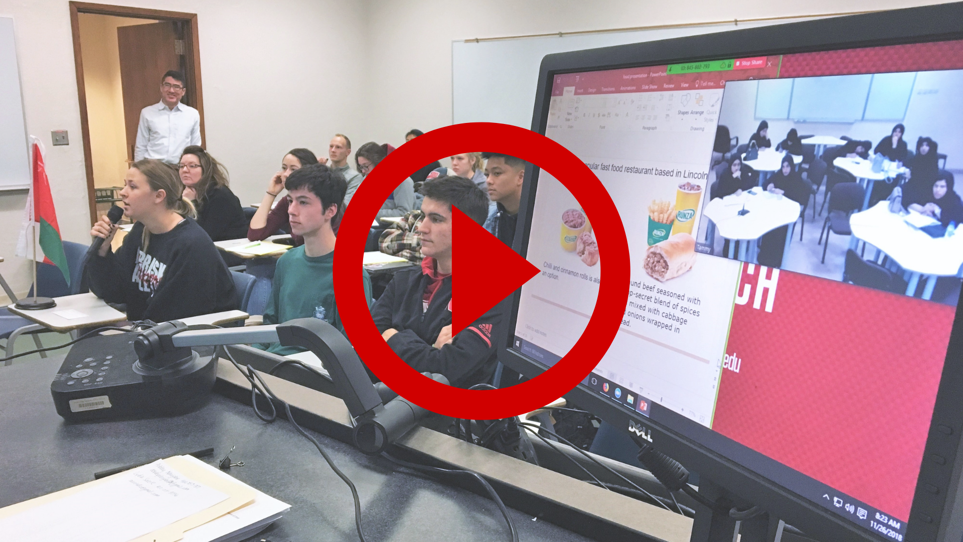 University of Nebraska-Lincoln students engage in virtual exchange with peers at an institution in the Middle East during class using video conferencing technology. 