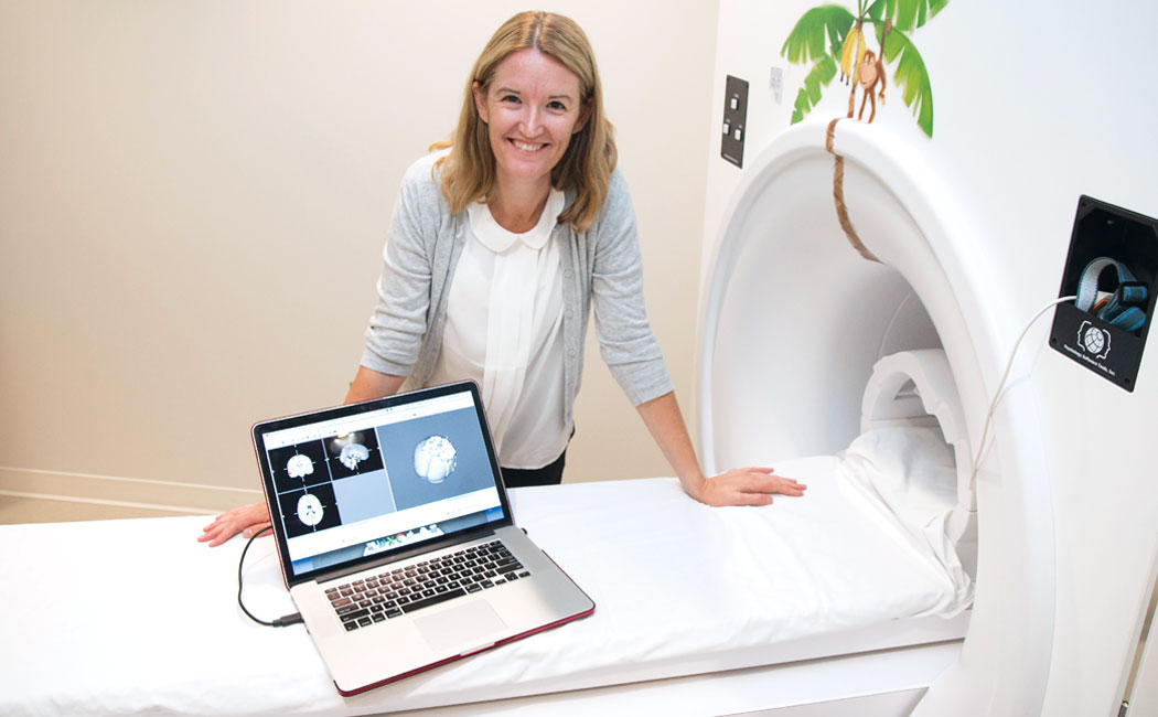 Carrie Clark, assistant professor of educational psychology, is using functional MRI technology to explore children’s brain activity while they learn mathematics.