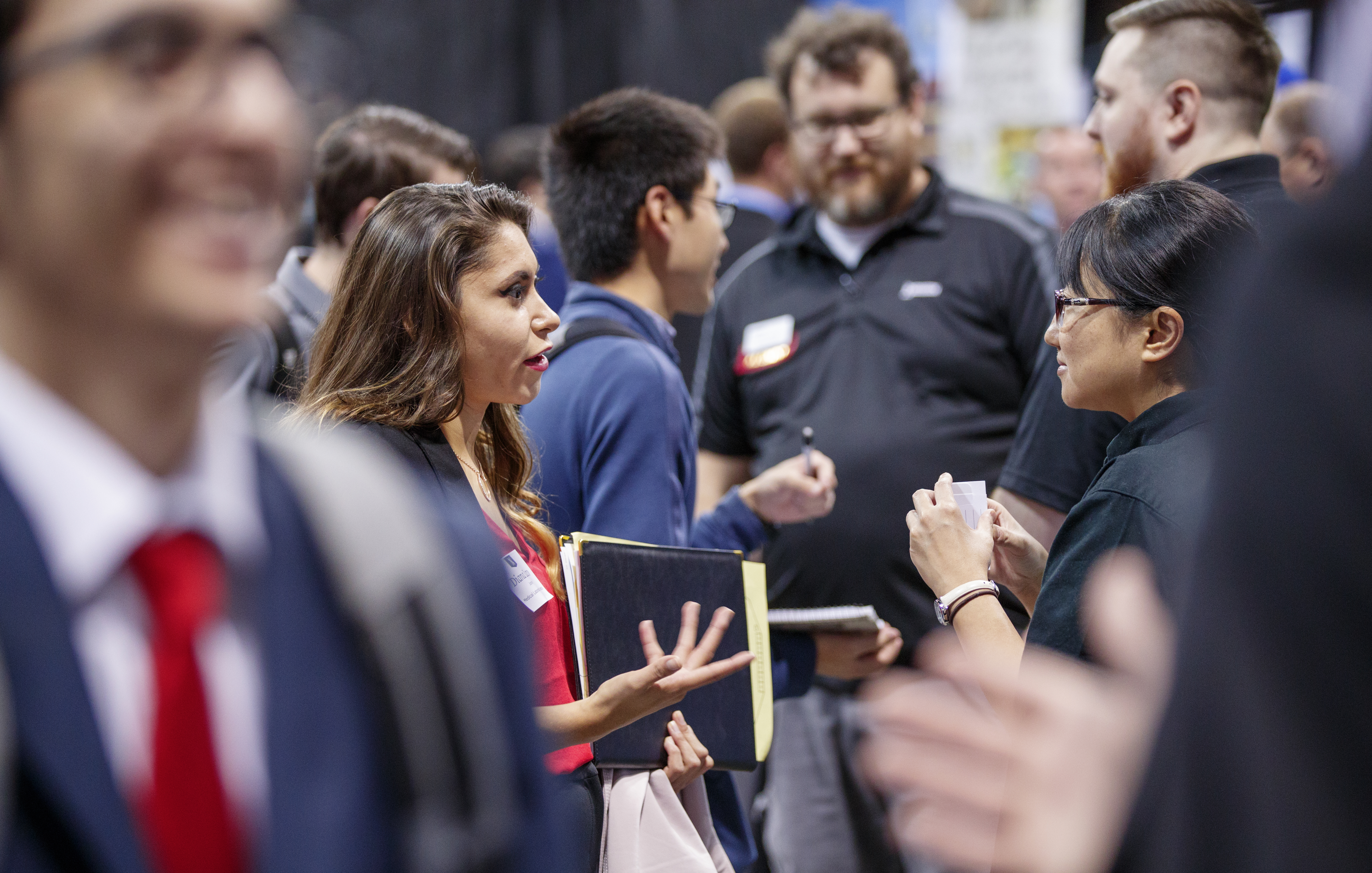 Huskers interact with potential employers during the University of Nebraska–Lincoln's fall 2018 career fair at Pinnacle Bank Arena.