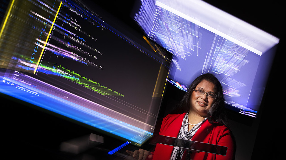 Bonita Sharif, assistant professor of computer science and engineering at Nebraska, is using eye-tracking technology to analyze how software programmers work in order to develop tools that help them write code better and faster. She has earned a $432,000 