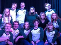 The University of Nebraska–Lincoln's Lazzi placed 2nd at the College Improv Tournament Heartland Regionals on Feb. 9 in Kansas City.  Faculty advisor Julie Uribe is pictured in the back row, third from the right. Courtesy photo.