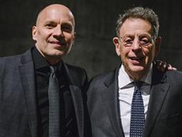 Paul Barnes (left) with Philip Glass. "A Celebration of Philip Glass," the April 2018 world premiere of a piano quintet by renowned composer Philip Glass, has won the Outstanding Event Award at the Mayor's Arts Awards. Photo by Walker Pickering.