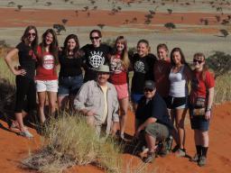 Larkin Powell poses with a group of Nebraska students during his Namibia study abroad program.