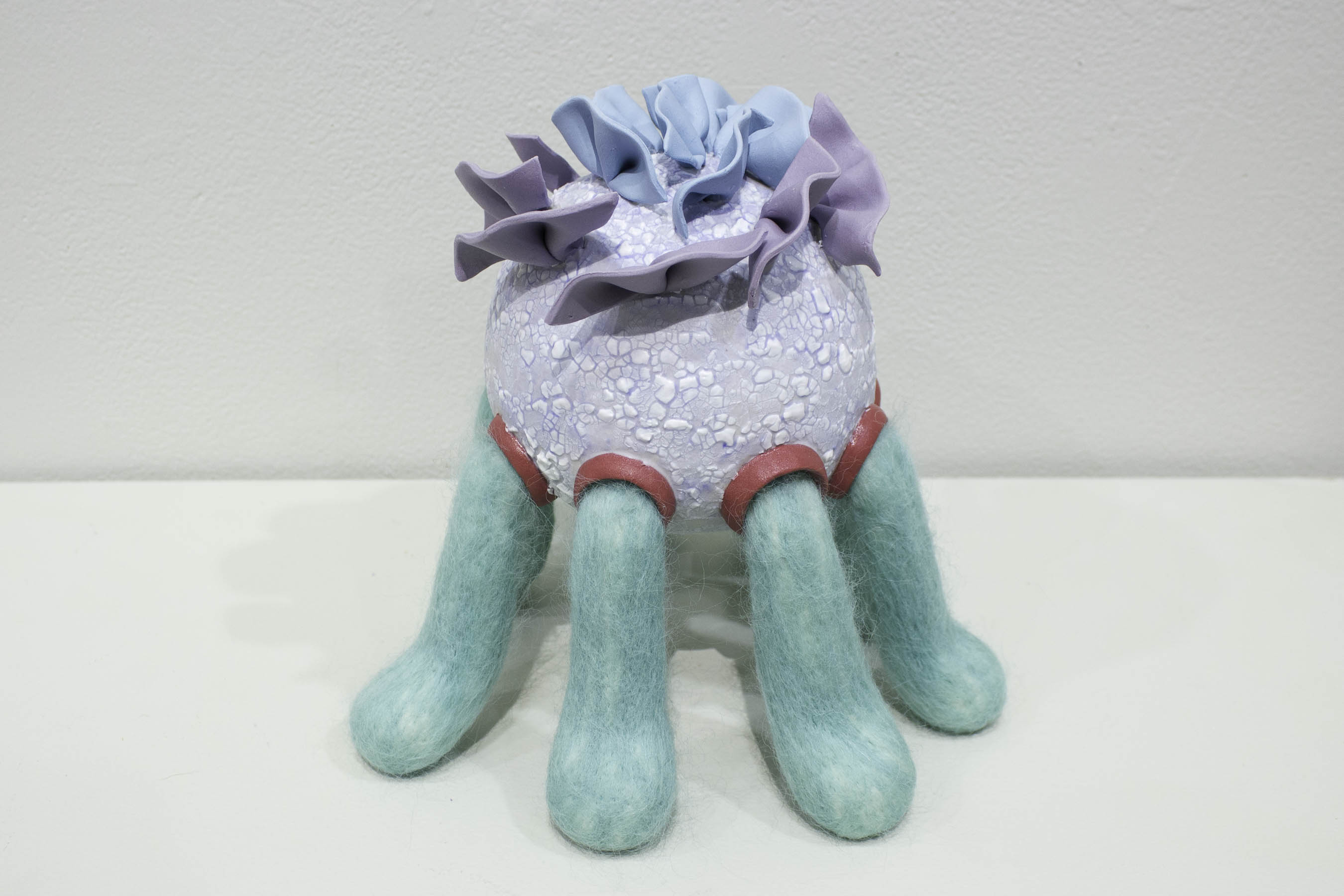 Kat Cox, Still Standing, Colored porcelain, Needle-felted wool, 8x8x8", 2018