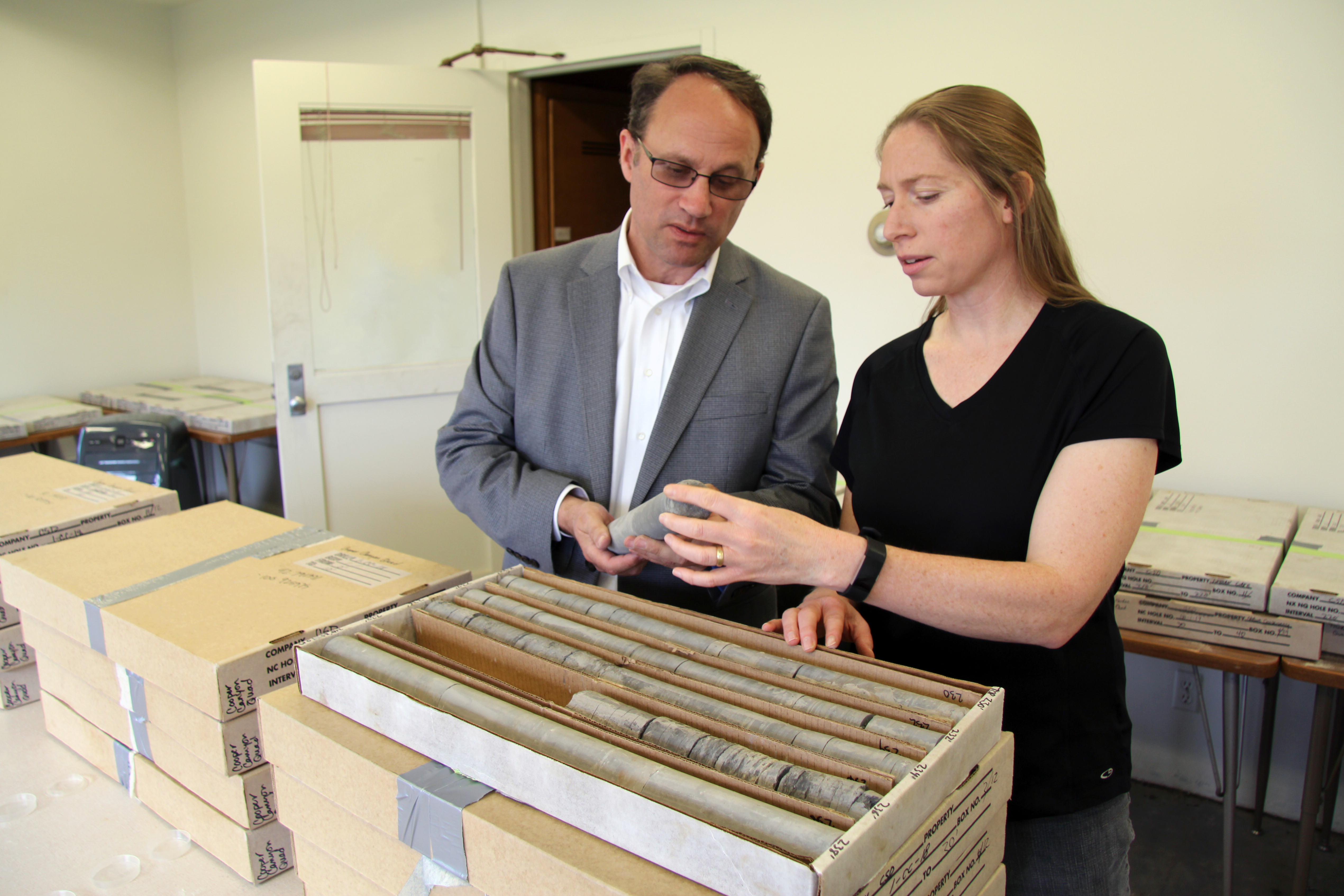 Matt Joeckel, state geologist, and Dana Divine, hydrogeoloist, both of the Conservation and Survey Division, examine a core on April 9, 2019, on the University of Nebraska-Lincoln East Campus. | Shawna Richter-Ryerson, Natural Resources