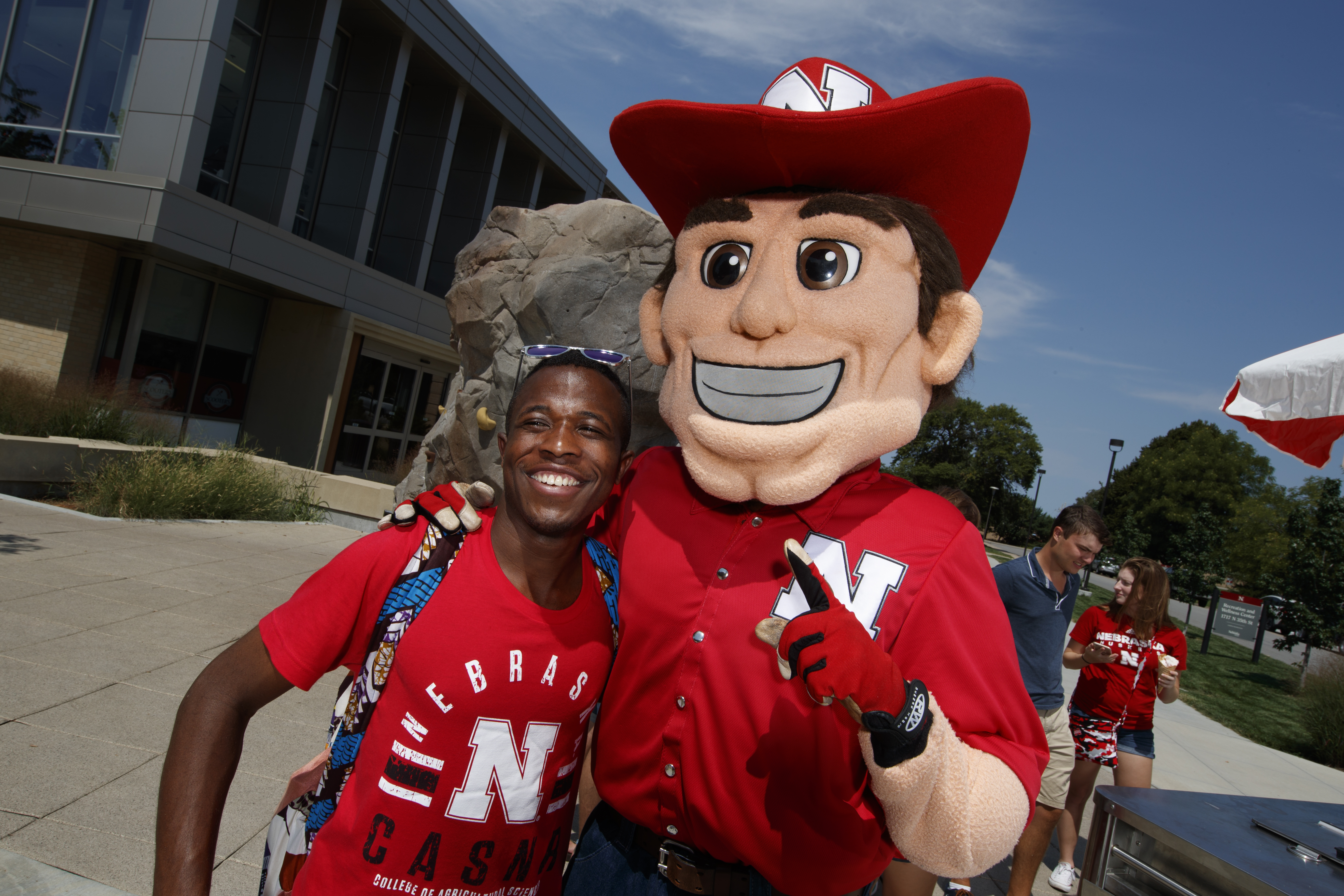 Student with Herbie Husker