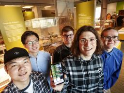 A team of students from computer science and engineering built a virtual reality app to enhance the information at the Nebraska State Museum's new Cherish Nebraska exhibit. The team is comprised of (from left) Ziyuan Ye, JunShen Ban, Brandon Heuttner, Mat