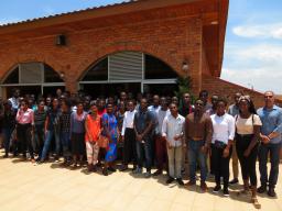 Lecturer Tim Janda (far right) stands with the 58 CUSP scholarship finalists in Kigali, Rwanda.