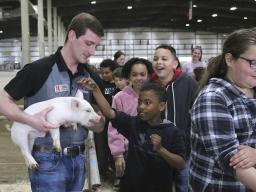 Extension Assistant Calvin DeVries (pictured at left) helped organize the Agricultural Literacy Festival. (Photo by Vicki Jedlicka, Nebraska Extension in Lancaster County)