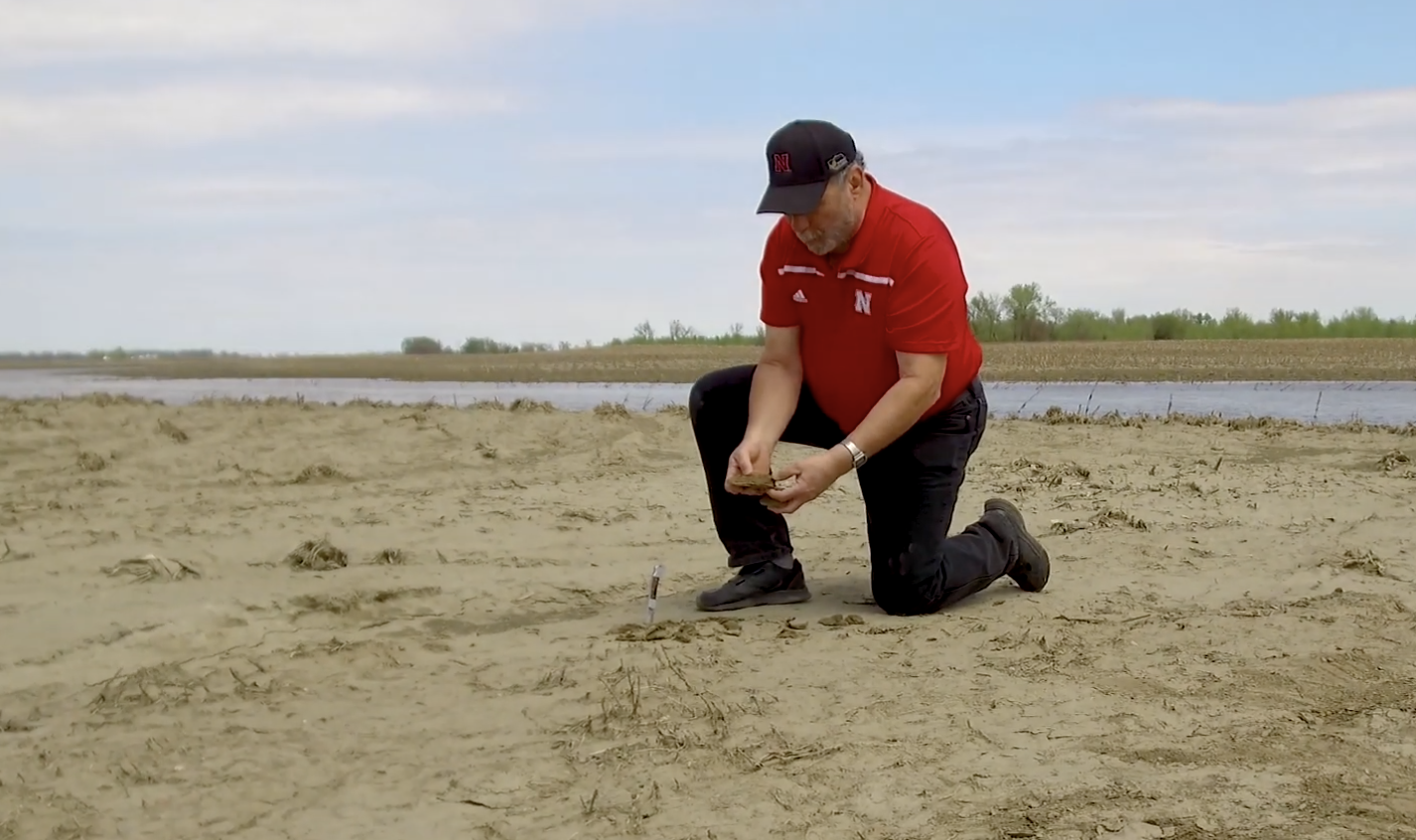 John Wilson in a flooded field. 