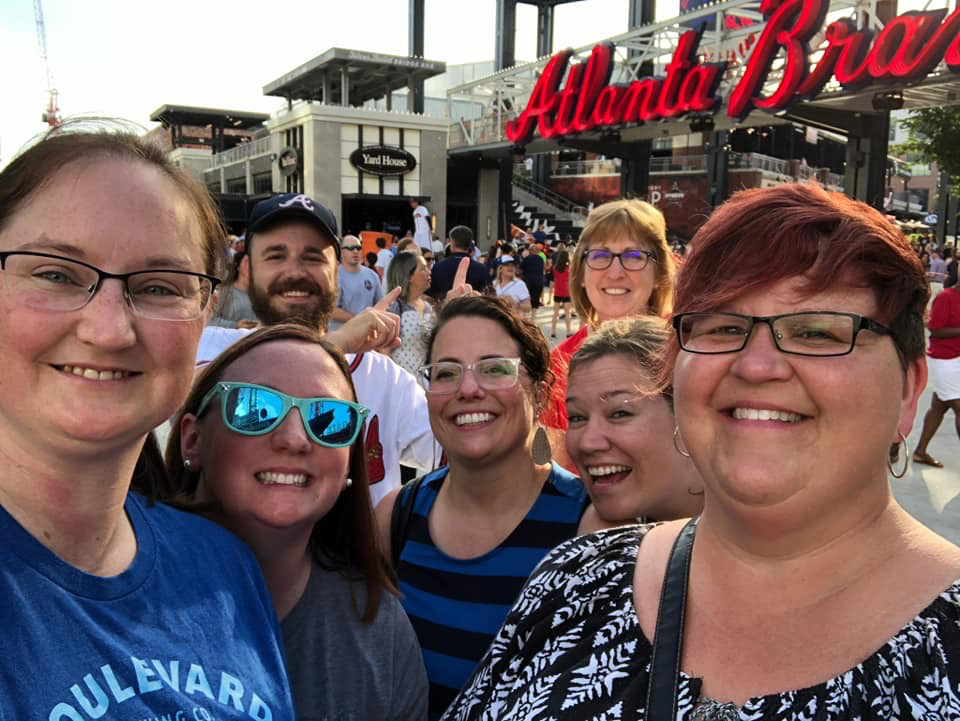OPS teachers attend Atlanta Braves game (far left Mary Kate Thraen, center Jessica Korth, back row right Lynn West and far right Tanya Archie)