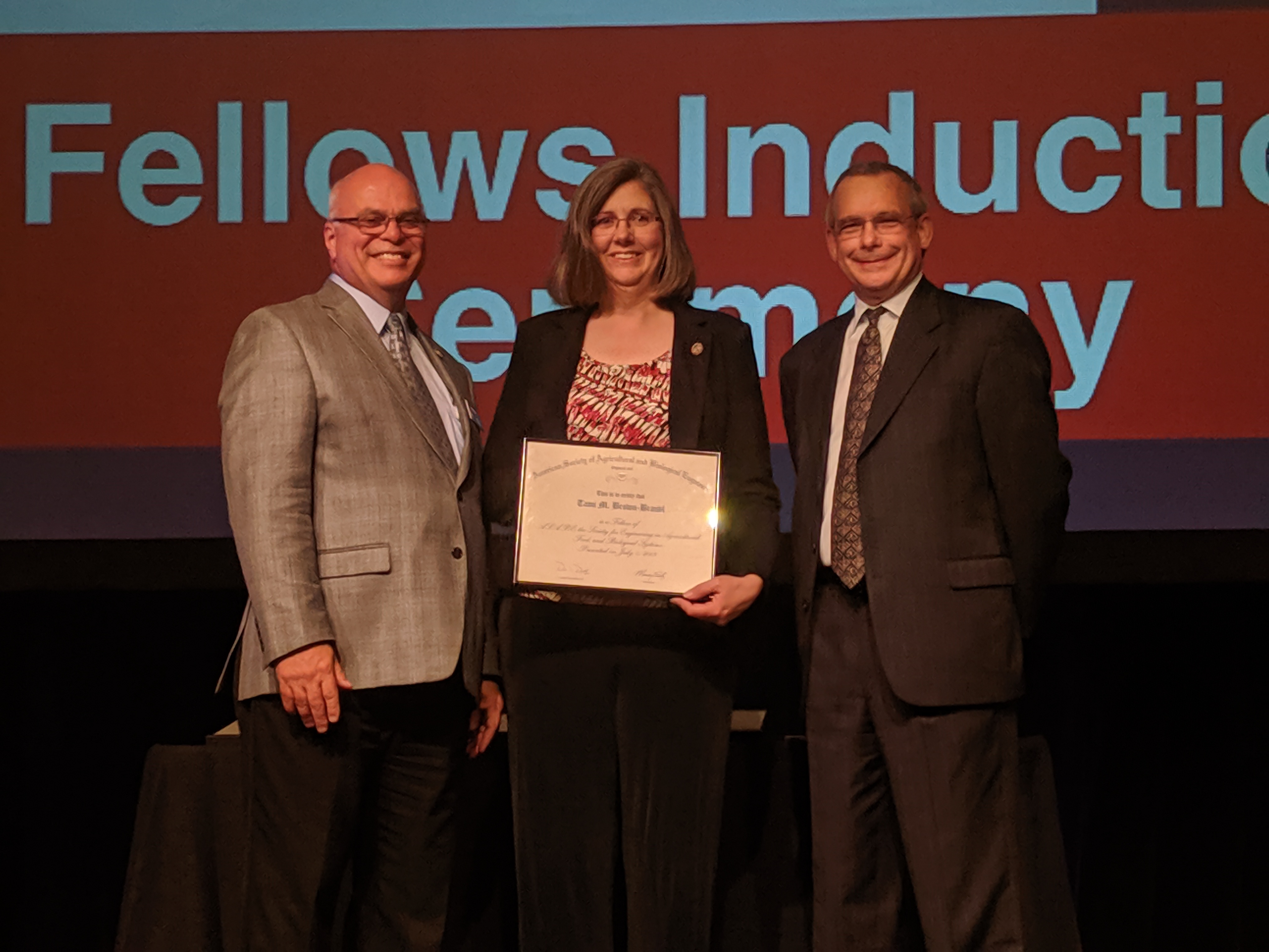 Tami Brown-Brandl, David Jones, and ASABE President Maury Salz