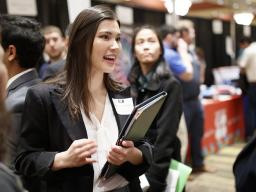 Sarah Clark, senior in computer science, talks with a recruiter during day two of the spring 2019 Career Fair. | Craig Chandler, University Communication