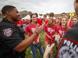 Officers from Nebraska's University Police Department interact with students at a back-to-school event last August.