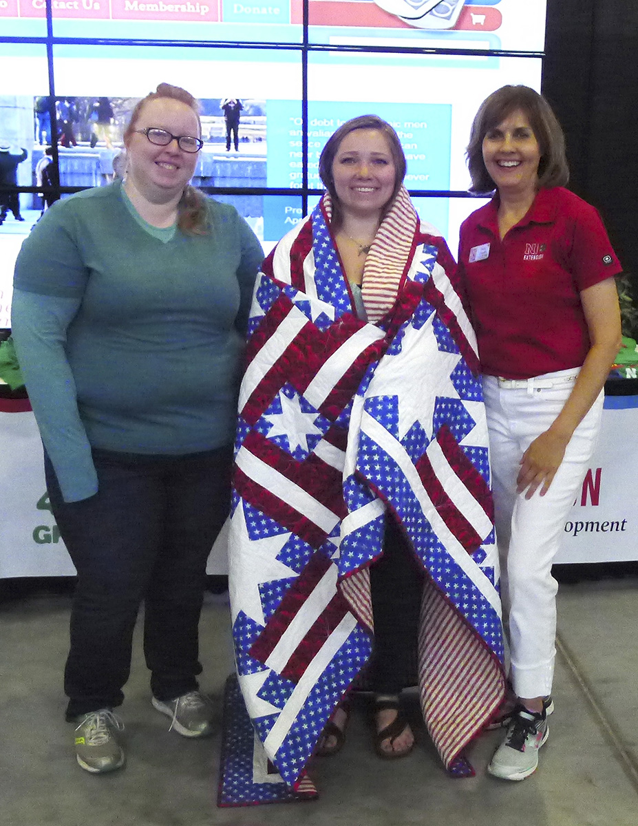 (L–R) 4-H volunteer Mary Burroughs; veteran and  4-H summer intern Rachel Wells; and 4-H staff member Kristin Geisert.