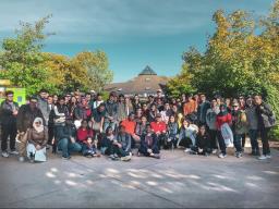 International students and scholars pose for a group photo at the Omaha Henry Doorly Zoo visit that include 115 participants, hosted by ISSO in October.