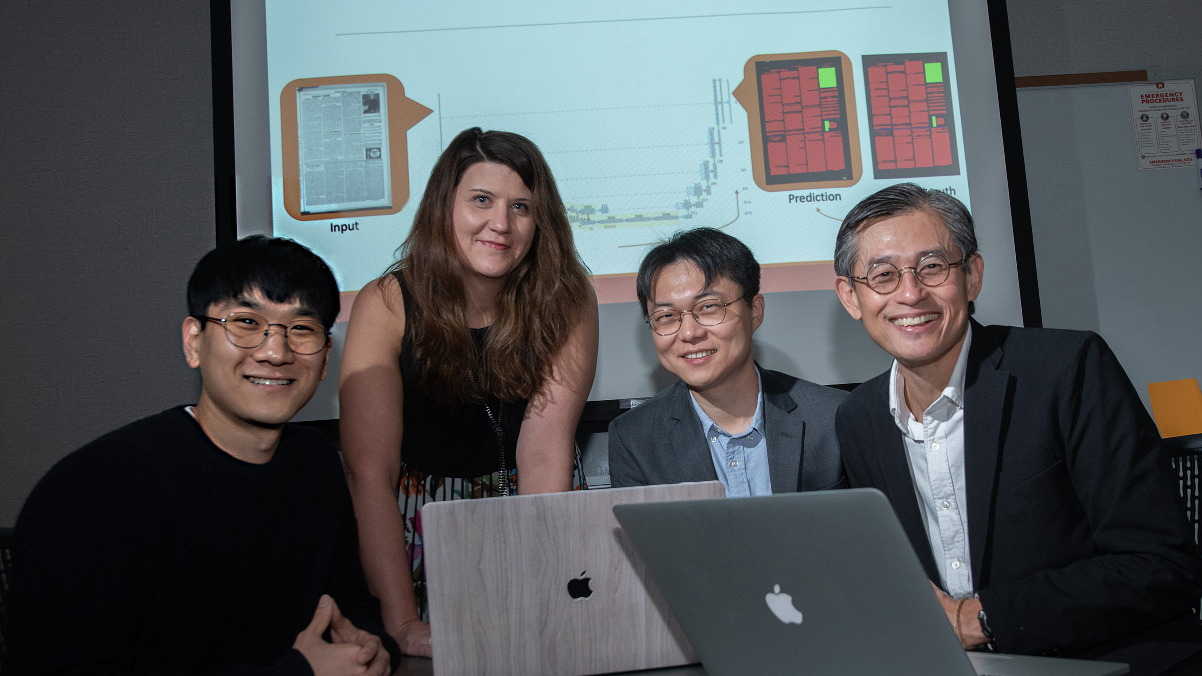 Members of the Aida lab (from left) Chulwood Pack, graduate student; Elizabeth Lorang, associate professor in University Libraries; Yi Liu, graduate student; and Leen-Kiat Soh, professor of computer science and engineering, recently completed research on 