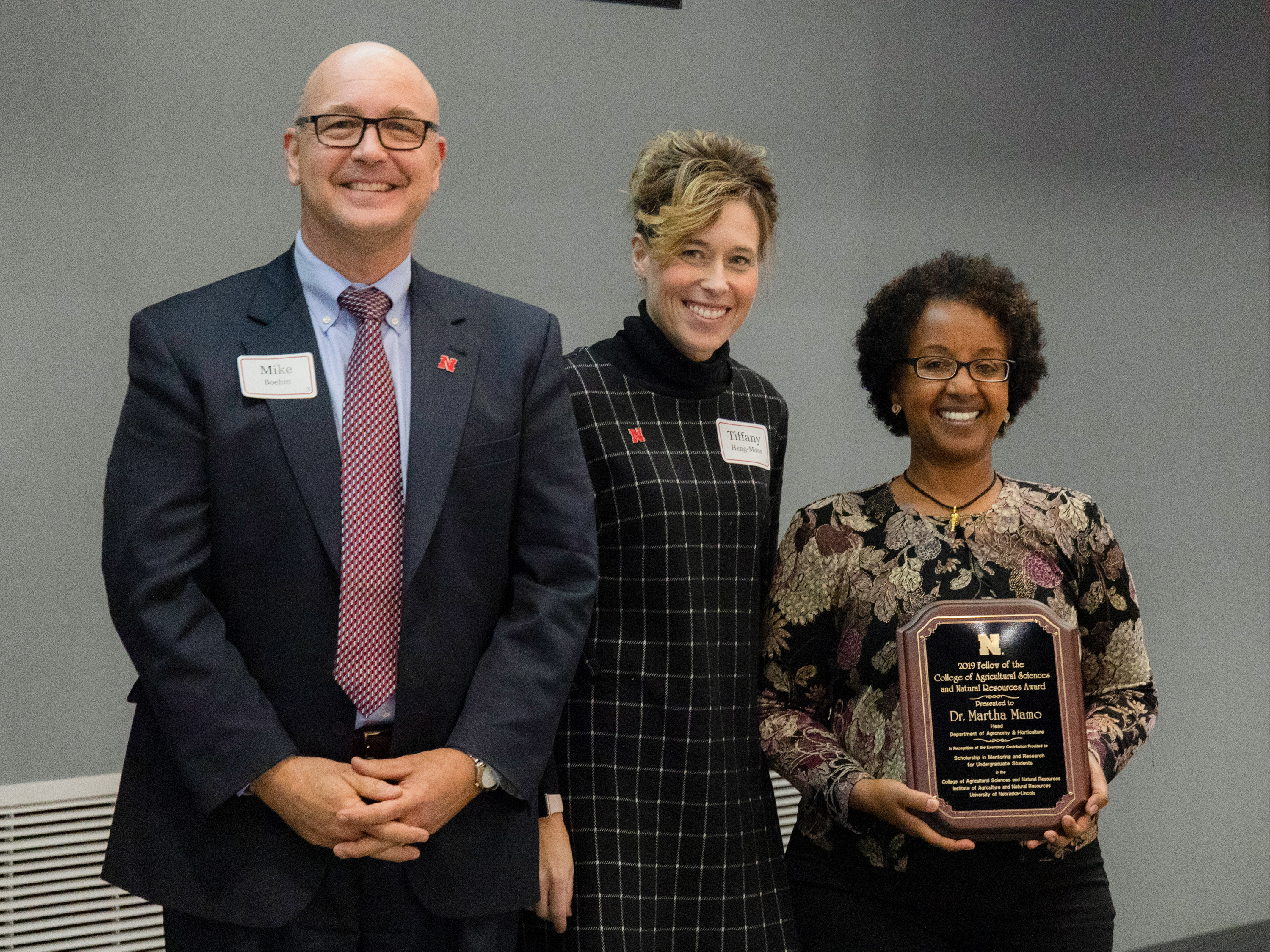 IANR Vice Chancellor Michael Boehm, left, CASNR Dean Tiffany Heng-Moss and Martha Mamo.