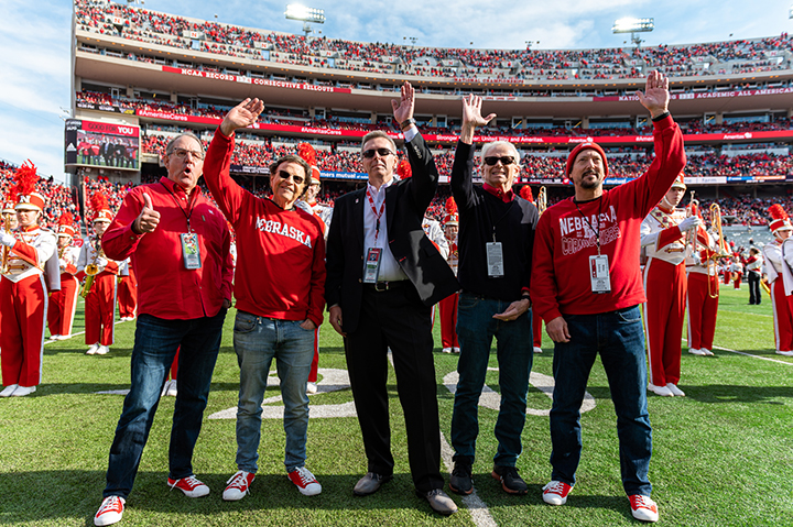 Members of the Johnny Carson Foundation are introduced at halftime during the Husker football game on Nov. 16. Left to right:  Jeff Sotzing, Allan Alexander, Chancellor Ronnie Green, Lawrence Heller and Larry Witzer. Photo by Justin Mohling.