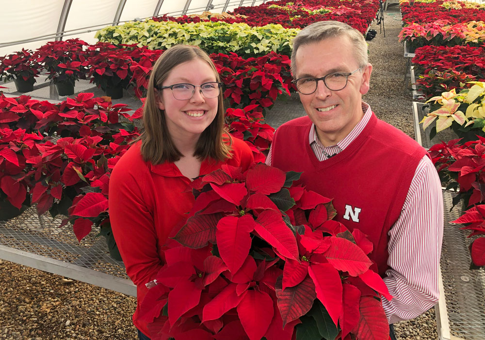 Chancellor Digs Into Students’ Annual Poinsettia Sale 