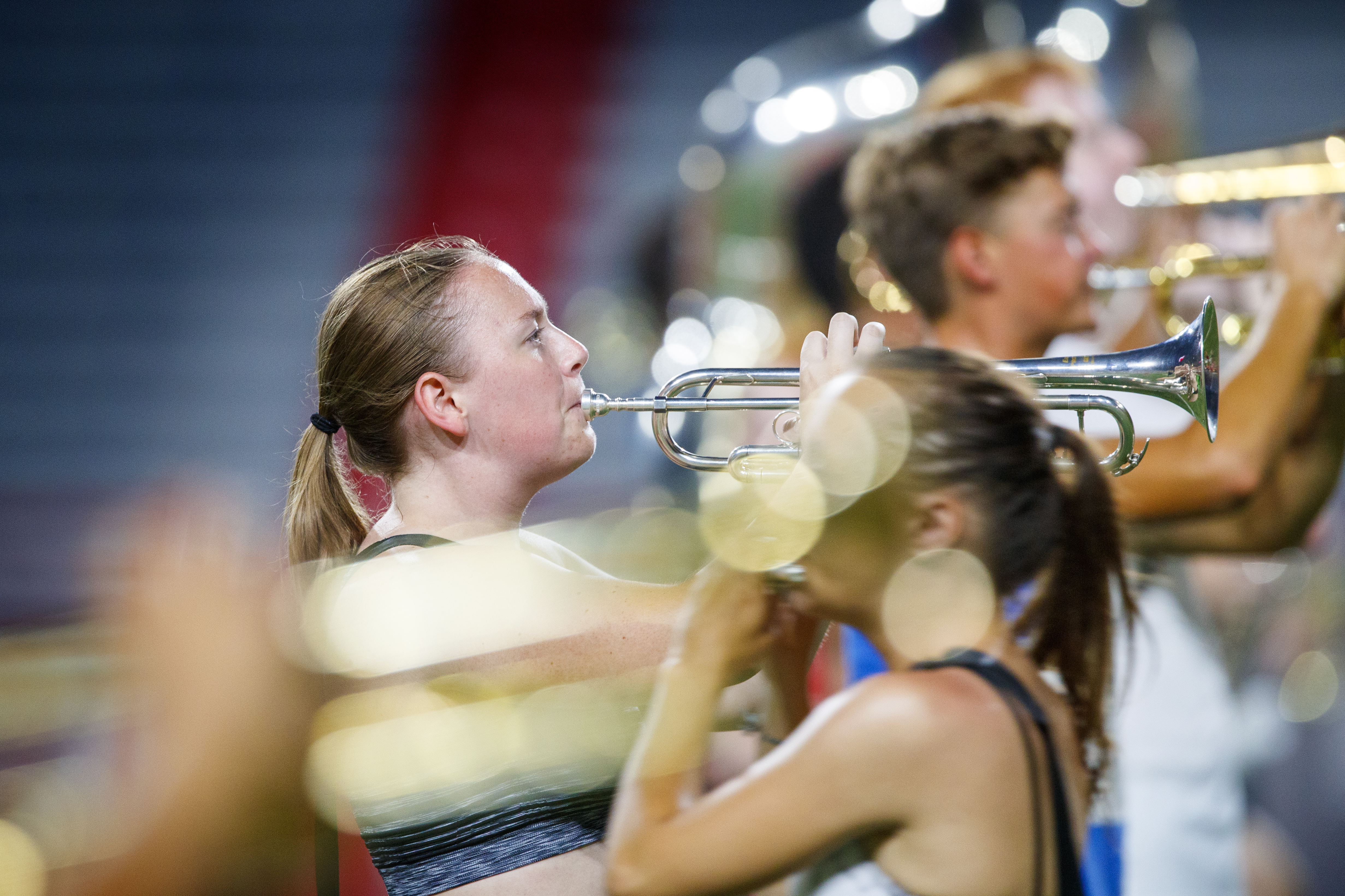 Jenna McCoy and the Cornhusker Marching Band goes through their pregame routing during Tuesday evening practice in Memorial Stadium. August 20, 2019. | Craig Chandler, University Communication