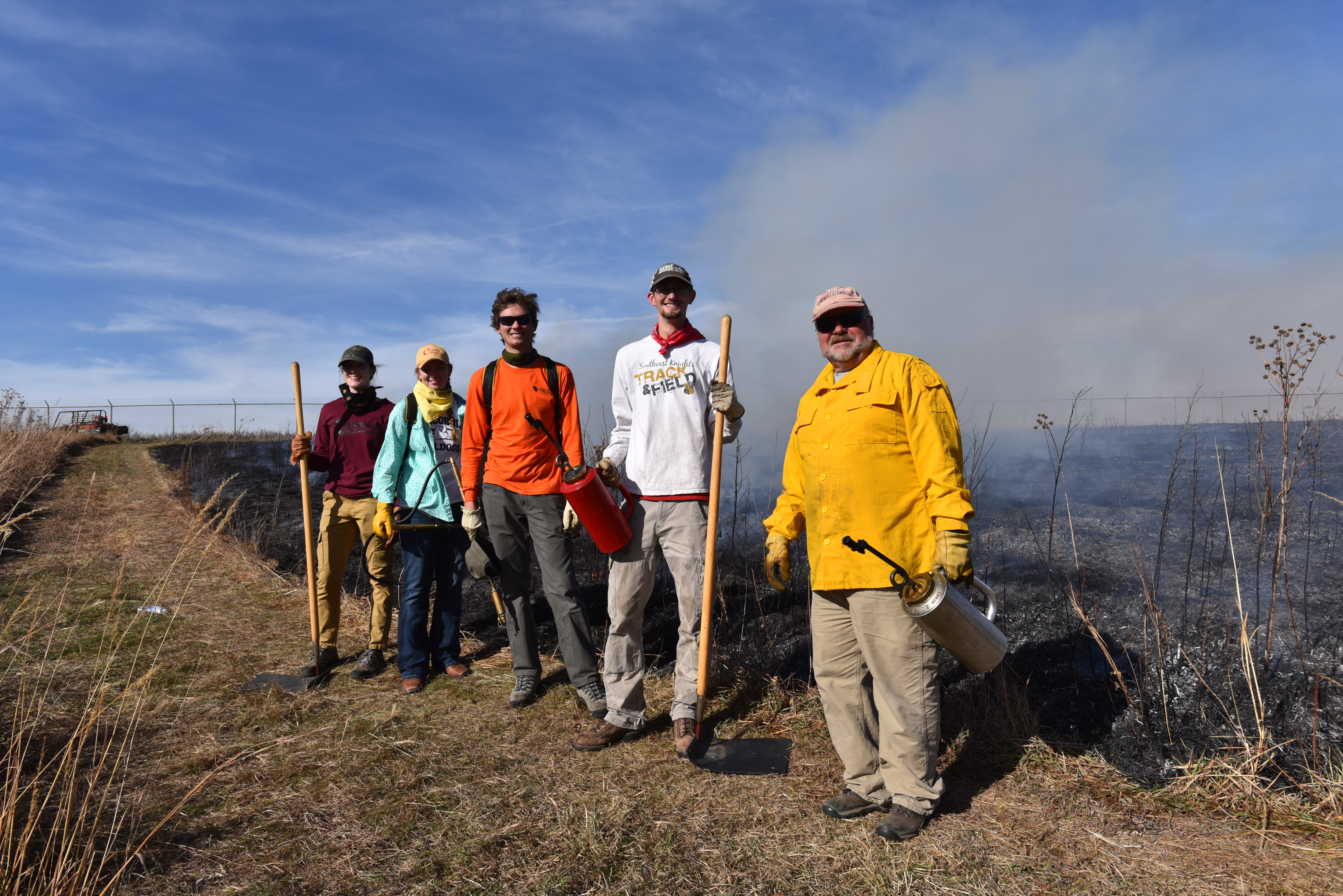 In November 2019, Dave Wedin, ecosystem ecologist from of SNR (right), conducted a prescribed fire demonstration at Nine-Mile Prairie with four students and one (not pictured) volunteer. | Shawna Richter-Ryerson, Natural Resources