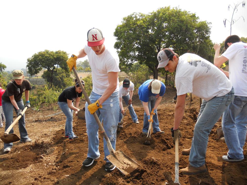 UNL students work alongside local Mayan families to construct basic concrete block housing.