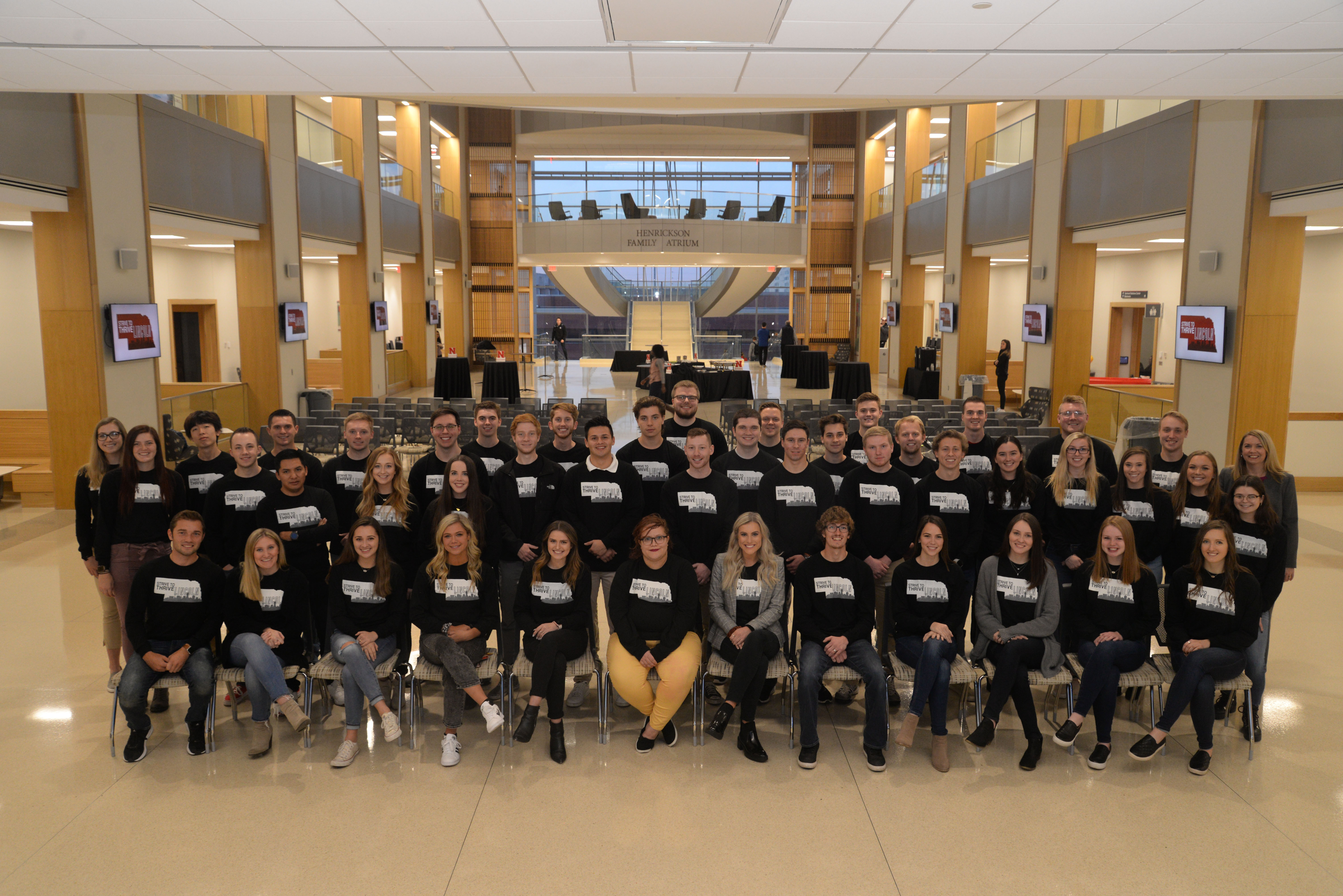 Members of the Fall '19 MNGT 411 class in Hawks Hall following the Awards Ceremony