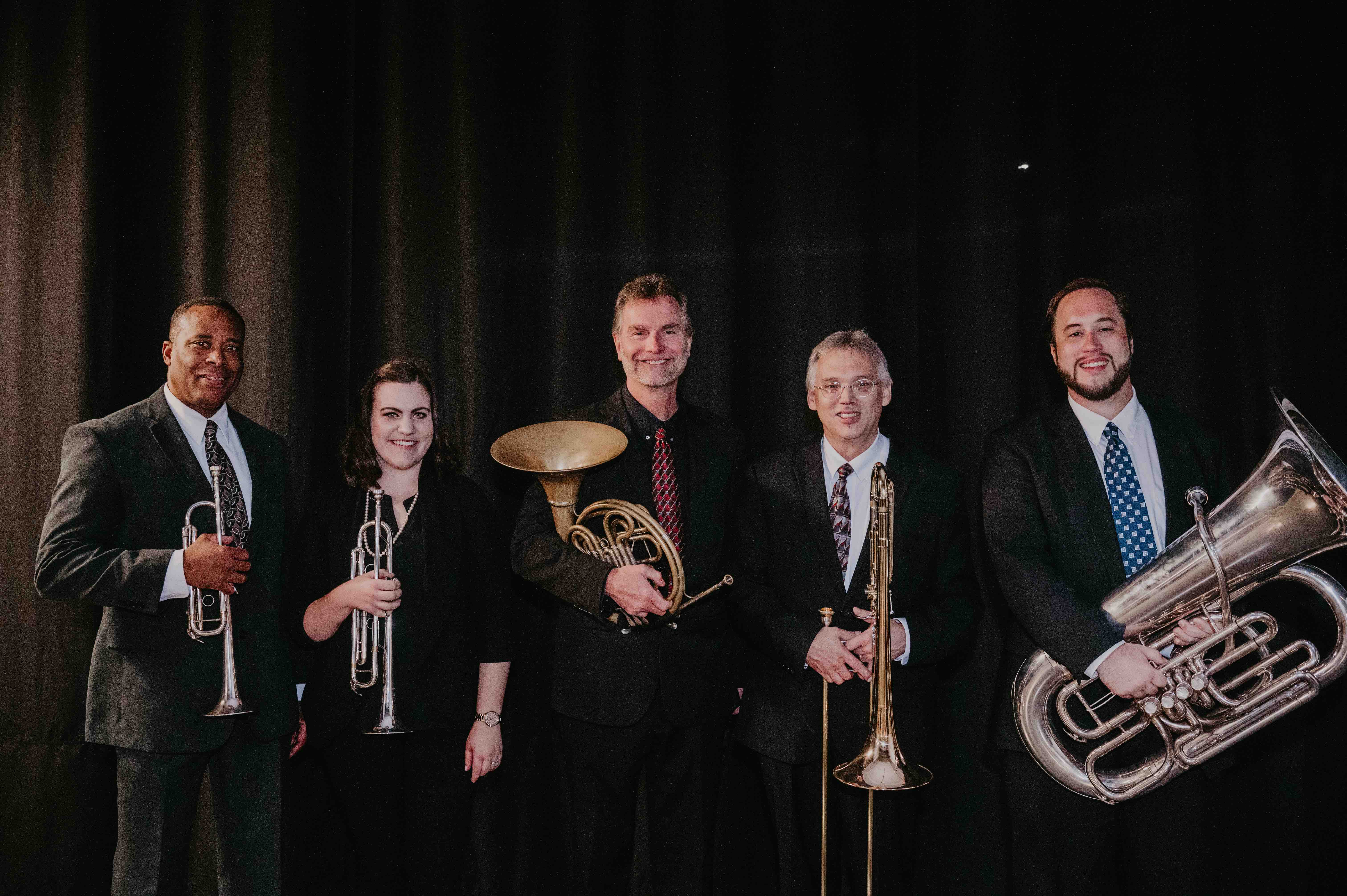 The University of Nebraska Brass Quintet will perform on March 30 in Kimball Hall. The quintet includes left to right: Darryl White, trumpet; Catherine Sharp-Martinez, trumpet; Alan Mattingly, horn; Scott Anderson, trombone; and Ravil "Bo" Atlas, tuba.