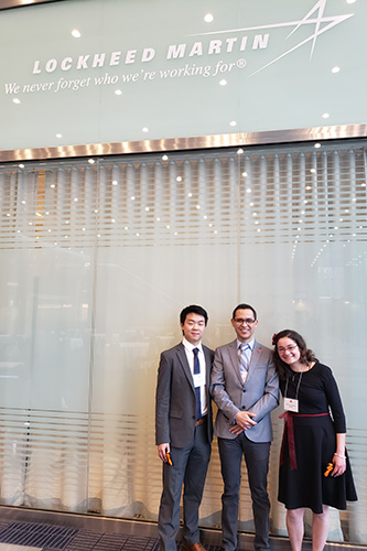 The Nebraska team of Parker Segal (left) and Maureen Winter (right) took fourth place at the Lockheed Martin Ethics in Engineering Case Competition. Mohamad Amar (center) was faculty advisor.