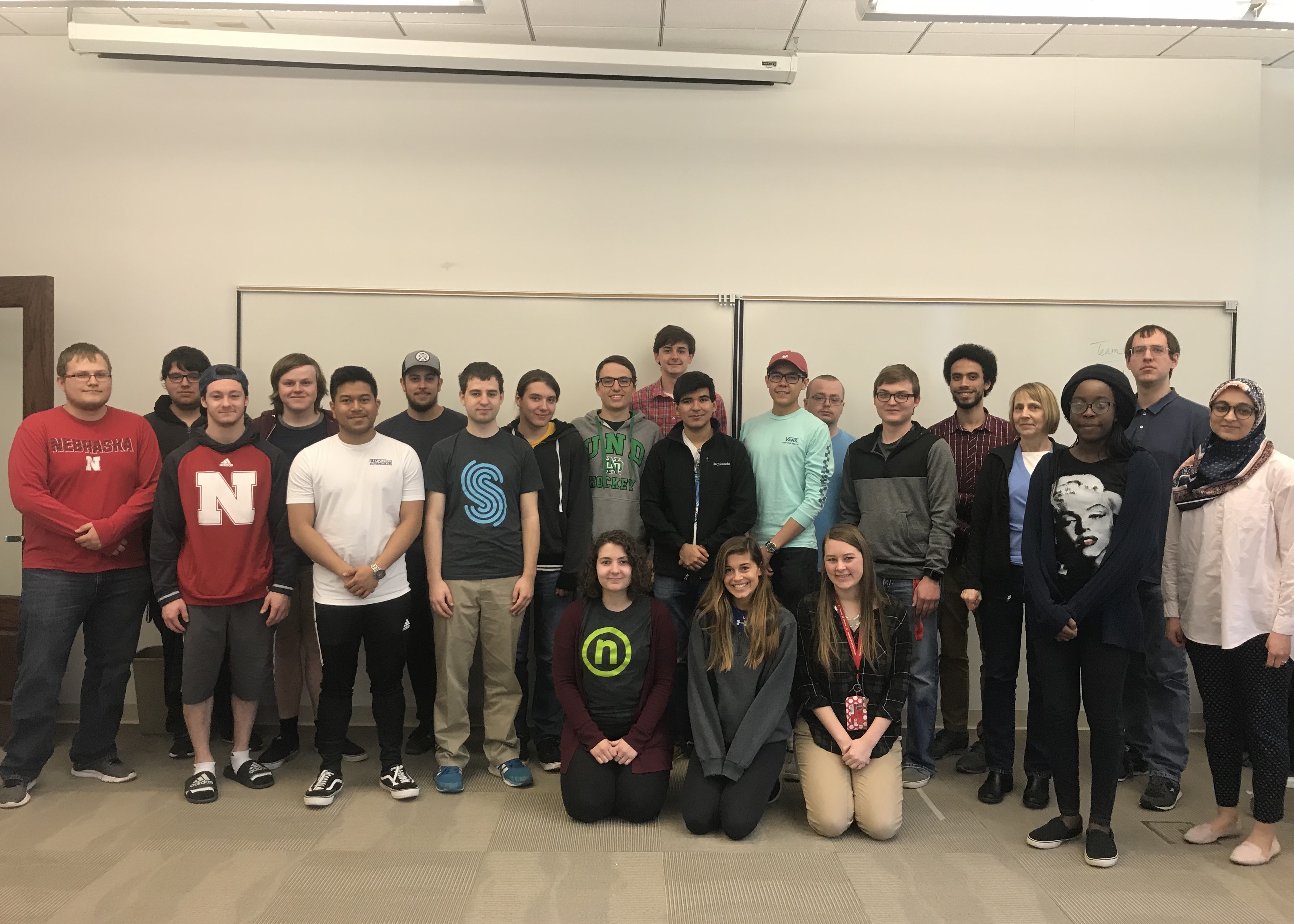 Members of CSE's first software engineering cohort pose after presenting their projects in SOFT 261.