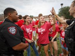 University Police officers interact directly with students during the chancellor's barbecue at the start of the 2019 fall semester. The department has recently made changes that focus on community engagement. 