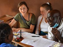2 Nebraska students sit in on a local meeting during their “Food Security, Health and Nutrition” program in Zambia and Ethiopia in summer 2019. Led by Mary Willis, the study abroad program has included 15 Husker Gilman Scholars since its inception in 2014