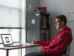 James Wooldridge, a senior journalism major, studies in his Lincoln apartment during the spring 2020 semester. After a shift in the fall academic calendar, the university is offering a three-week session starting Nov. 30.