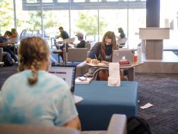 Huskers work in the Adele Hall Learning Commons between classes during the fall semester's first day of in-person instruction. To help keep the campus community safe, facial coverings are to be worn jat all times indoors and when six-foot distancing canno
