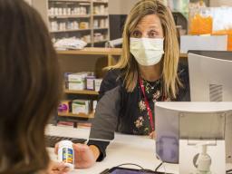 Student purchases an over-the-counter product from a pharmacy team member.