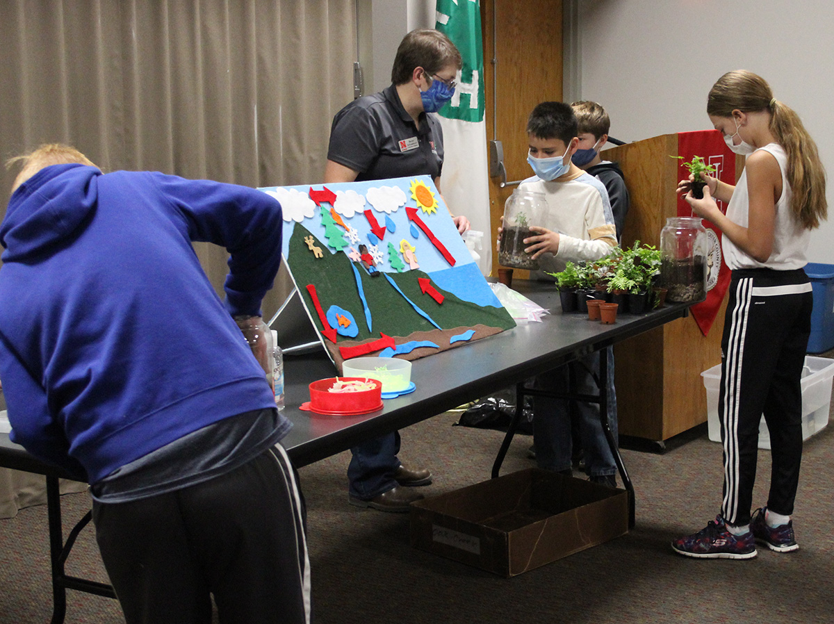 Extension Associate Becky Schuerman teaching the hydrologic cycle