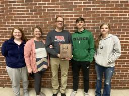 Jason Vitosh, center, of Falls City is the 2020 winner of the Nebraska Rural Community Schools Association's Outstanding Secondary Teacher of the Year Award.