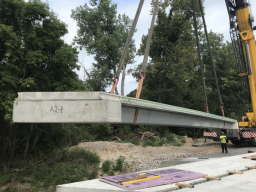 Valmont Structures© Con-Struct™ precast bridge deck being placed.